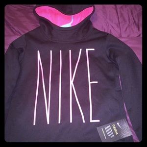 pink and black Nike hoodie